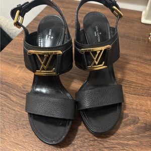 Louis Vuitton Black Sandals with Gold Logo